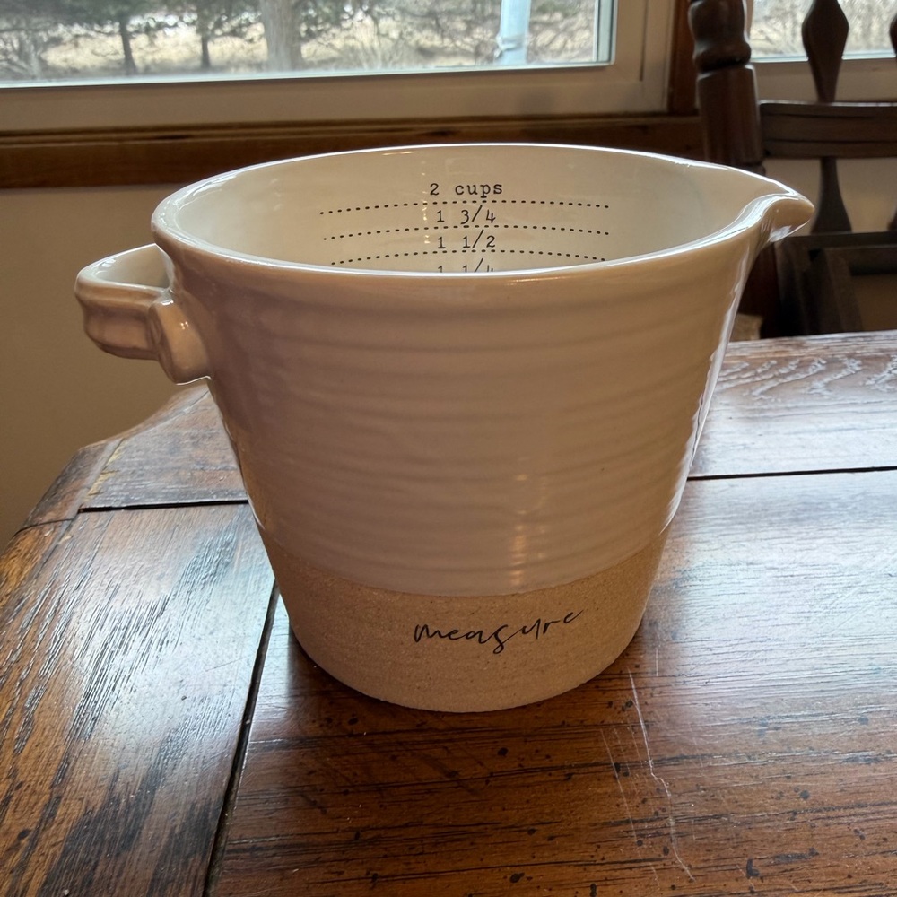 Mud Pie liquid measuring cup. Never been used.